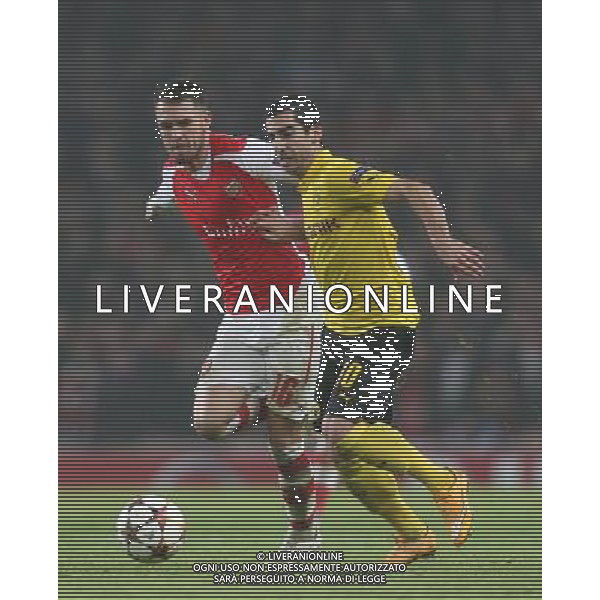 Borussia Dortmund\'s Henrikh Mkhitaryan under pressure from Arsenal\'s Aaron Ramsey Photographer Kieran Galvin/CameraSport Football - UEFA Champions League First Round Group D - Arsenal v Borussia Dortmund - Wednesday 26th November 2014 - Emirates Stadium - London © CameraSport - 43 Linden Ave. Countesthorpe. Leicester. England. LE8 5PG - Tel: +44 (0) 116 277 4147 - admin@camerasport.com - www.camerasport.com AG ALDO LIVERANI SAS ONLY ITALY
