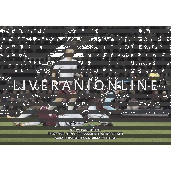 Burnley\'s Lukas Jutkiewicz is is fouled by Aston Villa\'s Jores Okore earning a penalty Photographer Rich Linley/CameraSport Football - Barclays Premiership - Burnley v Aston Villa - Saturday 29th November 2014 - Turf Moor - Burnley © CameraSport - 43 Linden Ave. Countesthorpe. Leicester. England. LE8 5PG - Tel: +44 (0) 116 277 4147 - admin@camerasport.com - www.camerasport.com AG ALDO LIVERANI SAS ONLY ITALY