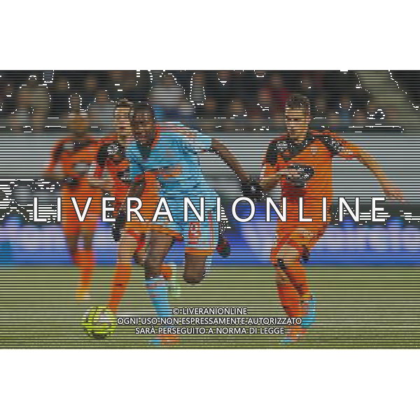 Giannelli IMBULA / Maxime BARTHELME - 02.12.2014 - Lorient / Marseille - 16eme journee de Ligue 1 Photo : Vincent Michel / Icon Sport AG ALDO LIVERANI SAS ONLY ITALY