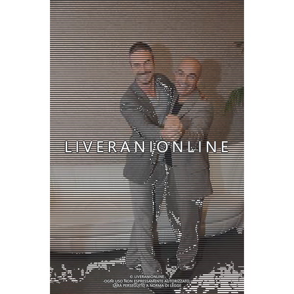 Photocall \' sette spose per sette fratelli \' Milano teatro nuovo 03 dicembre 2014 nella foto: Massimo Romeo Piparo regista con Flavio Montrucchio ©Gazzaniga/AGENZIA ALDO LIVERANI SAS 