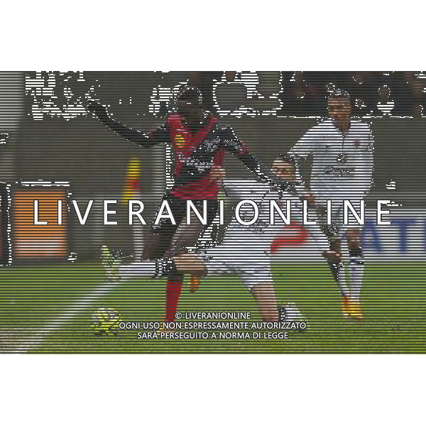 Sambou YATABARE / Florian RASPENTINO - 03.12.2014 - Guingamp / Caen - 16eme journee de Ligue 1 Photo : Vincent Michel / Icon Sport AG ALDO LIVERANI SAS ONLY ITALY