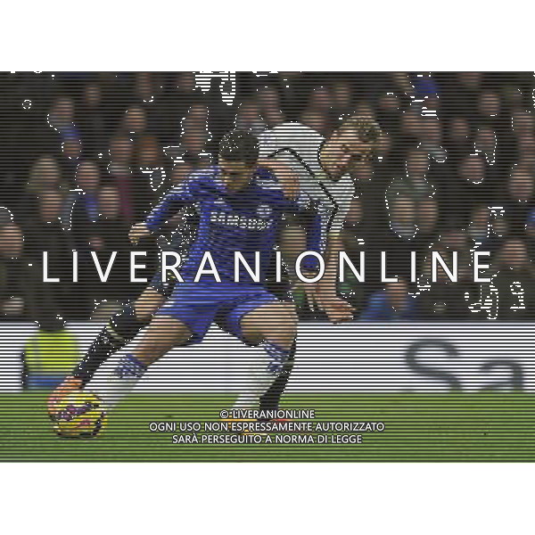 Chelsea\'s Eden Hazard holds off the challenge from Tottenham Hotspur\'s Harry Kane Photographer Ashley Western/CameraSport Football - Barclays Premiership - Chelsea v Tottenham Hotspur - Wednesday 3rd December 2014 - Stamford Bridge - London © CameraSport - 43 Linden Ave. Countesthorpe. Leicester. England. LE8 5PG - Tel: +44 (0) 116 277 4147 - admin@camerasport.com - www.camerasport.com AG ALDO LIVERANI SAS ONLY ITALY