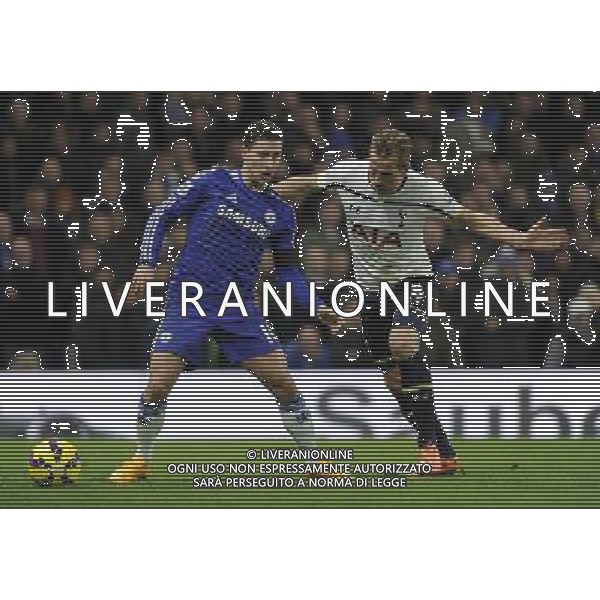 Chelsea\'s Eden Hazard holds off the challenge from Tottenham Hotspur\'s Harry Kane Photographer Ashley Western/CameraSport Football - Barclays Premiership - Chelsea v Tottenham Hotspur - Wednesday 3rd December 2014 - Stamford Bridge - London © CameraSport - 43 Linden Ave. Countesthorpe. Leicester. England. LE8 5PG - Tel: +44 (0) 116 277 4147 - admin@camerasport.com - www.camerasport.com AG ALDO LIVERANI SAS ONLY ITALY
