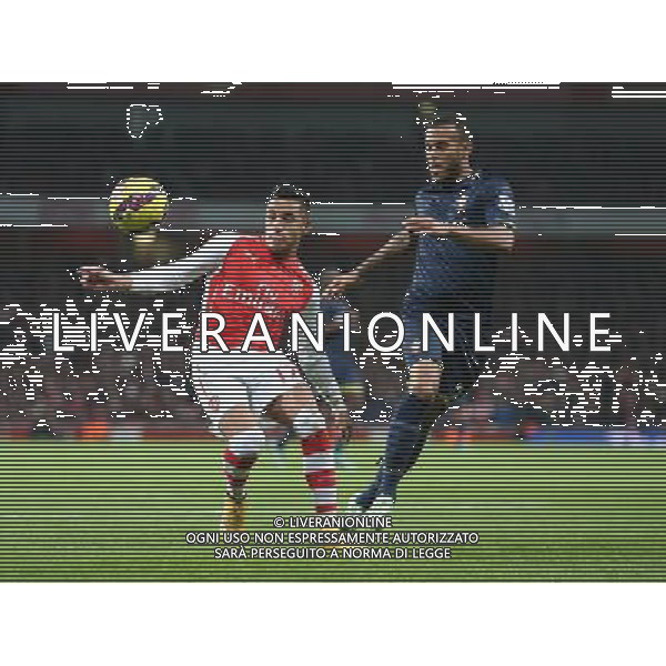 Arsenal\'s Alexis Sanchez under pressure from Southampton\'s Ryan Bertrand Photographer Kieran Galvin/CameraSport Football - Barclays Premiership - Arsenal v Southampton - Wednesday 3rd December 2014 - The Emirates Stadium - London © CameraSport - 43 Linden Ave. Countesthorpe. Leicester. England. LE8 5PG - Tel: +44 (0) 116 277 4147 - admin@camerasport.com - www.camerasport.com AG ALDO LIVERANI SAS ONLY ITALY
