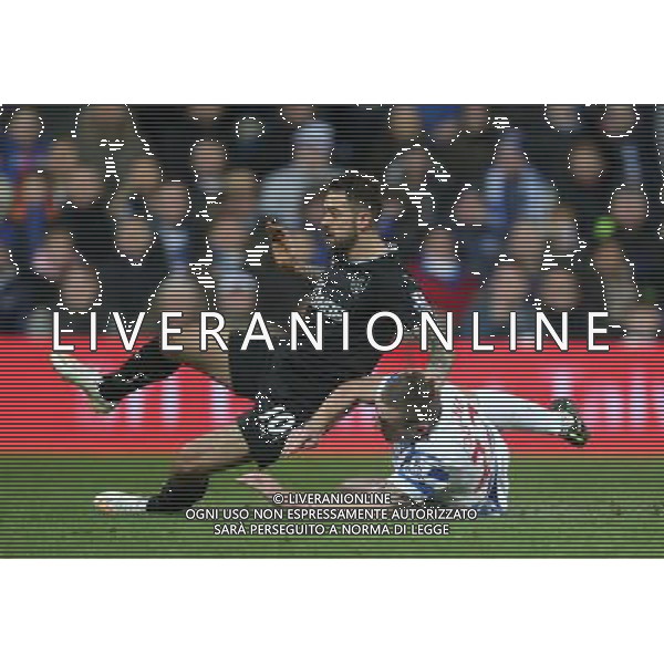 Burnley\'s Danny Ings under pressure from Queens Park Rangers\' Richard Dunne Photographer Kieran Galvin/CameraSport Football - Barclays Premiership - Queens Park Rangers ( QPR ) v Burnley - Saturday 6th December 2014 - Loftus Road Stadium - London - United Kingdom © CameraSport - 43 Linden Ave. Countesthorpe. Leicester. England. LE8 5PG - Tel: +44 (0) 116 277 4147 - admin@camerasport.com - www.camerasport.com AG ALDO LIVERANI SAS ONLY ITALY