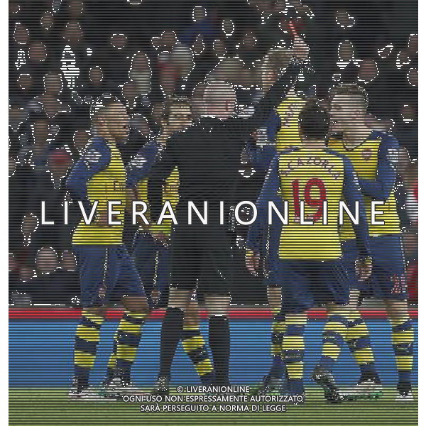Ref Anthony Taylor sends off Arsenal\'s Calum Chambers Photographer Mick Walker/CameraSport Football - Barclays Premiership - Stoke City v Arsenal - Saturday 6th December 2014 - Britannia stadium - Stoke © CameraSport - 43 Linden Ave. Countesthorpe. Leicester. England. LE8 5PG - Tel: +44 (0) 116 277 4147 - admin@camerasport.com - www.camerasport.com AG ALDO LIVERANI SAS ONLY ITALY