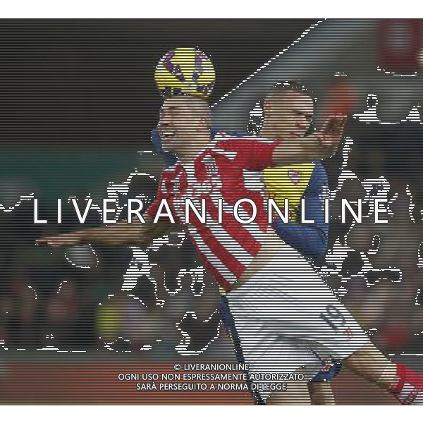 Stoke City\'s Jonathan Walters jumps with Arsenal\'s Kieran Gibbs Photographer Mick Walker/CameraSport Football - Barclays Premiership - Stoke City v Arsenal - Saturday 6th December 2014 - Britannia stadium - Stoke © CameraSport - 43 Linden Ave. Countesthorpe. Leicester. England. LE8 5PG - Tel: +44 (0) 116 277 4147 - admin@camerasport.com - www.camerasport.com AG ALDO LIVERANI SAS ONLY ITALY