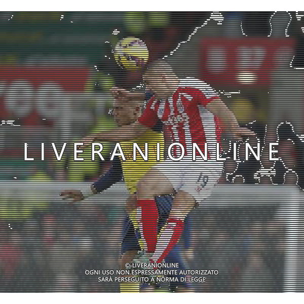 Stoke City\'s Jonathan Walters jumps with Arsenal\'s Kieran Gibbs Photographer Mick Walker/CameraSport Football - Barclays Premiership - Stoke City v Arsenal - Saturday 6th December 2014 - Britannia stadium - Stoke © CameraSport - 43 Linden Ave. Countesthorpe. Leicester. England. LE8 5PG - Tel: +44 (0) 116 277 4147 - admin@camerasport.com - www.camerasport.com AG ALDO LIVERANI SAS ONLY ITALY