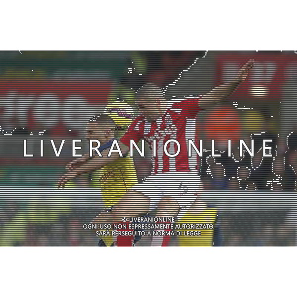Stoke City\'s Jonathan Walters jumps with Arsenal\'s Kieran Gibbs Photographer Mick Walker/CameraSport Football - Barclays Premiership - Stoke City v Arsenal - Saturday 6th December 2014 - Britannia stadium - Stoke © CameraSport - 43 Linden Ave. Countesthorpe. Leicester. England. LE8 5PG - Tel: +44 (0) 116 277 4147 - admin@camerasport.com - www.camerasport.com AG ALDO LIVERANI SAS ONLY ITALY