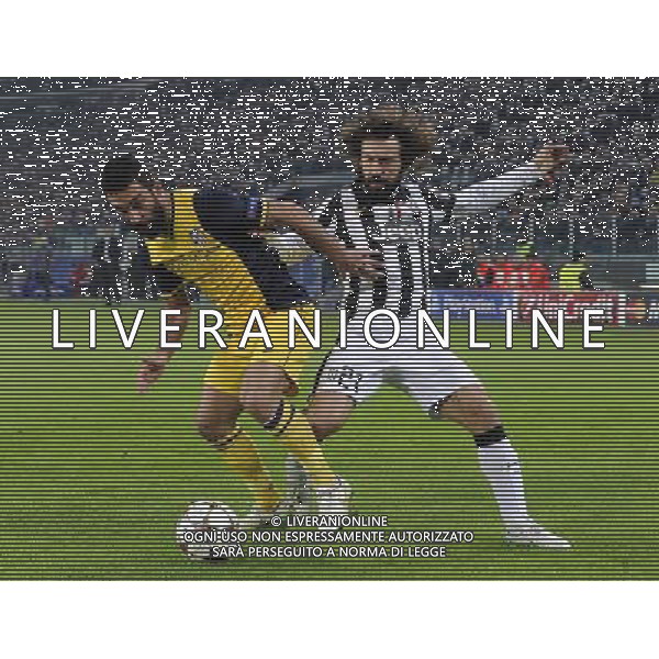 UEFA Champions League 2014/2015 Gruppo A Torino - 09.12.2014 Juventus-Atletico Madrid Nella Foto:arda turan e andrea pirlo /Ph.Vitez-Ag. Aldo Liverani