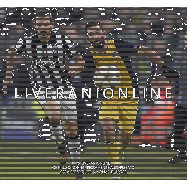 UEFA Champions League 2014/2015 Gruppo A Torino - 09.12.2014 Juventus-Atletico Madrid Nella Foto: leonardo bonucci e arda turan /Ph.Vitez-Ag. Aldo Liverani