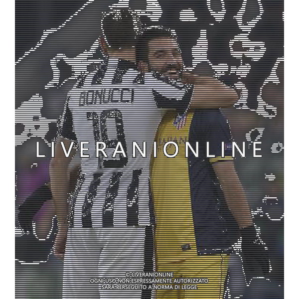 UEFA Champions League 2014/2015 Gruppo A Torino - 09.12.2014 Juventus-Atletico Madrid Nella Foto: leonardo bonucci e arda turan /Ph.Vitez-Ag. Aldo Liverani