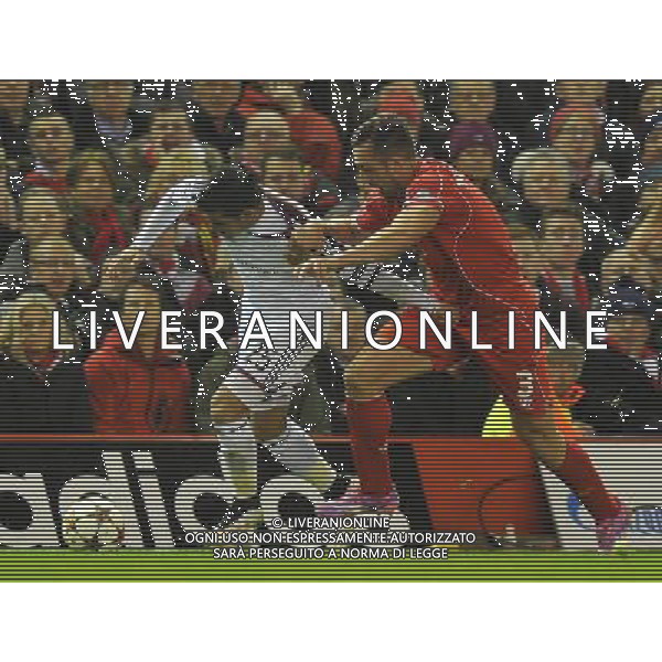 FC Basel\'s Derlis Gonz‡lez demonstrates ball control on Liverpool\'s JosŽ Enrique Photographer Dave Howarth/CameraSport Football - UEFA Champions League Group B - Liverpool v Basel - Tuesday 9th December 2014 - Anfield - Liverpool © CameraSport - 43 Linden Ave. Countesthorpe. Leicester. England. LE8 5PG - Tel: +44 (0) 116 277 4147 - admin@camerasport.com - www.camerasport.com AG ALDO LIVERANI SAS ONLY ITALY