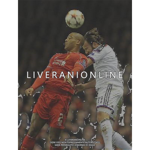 Liverpool\'s Glen Johnson out jumps FC Basel\'s Shkelzen Gashi Photographer Dave Howarth/CameraSport Football - UEFA Champions League Group B - Liverpool v Basel - Tuesday 9th December 2014 - Anfield - Liverpool © CameraSport - 43 Linden Ave. Countesthorpe. Leicester. England. LE8 5PG - Tel: +44 (0) 116 277 4147 - admin@camerasport.com - www.camerasport.com AG ALDO LIVERANI SAS ONLY ITALY