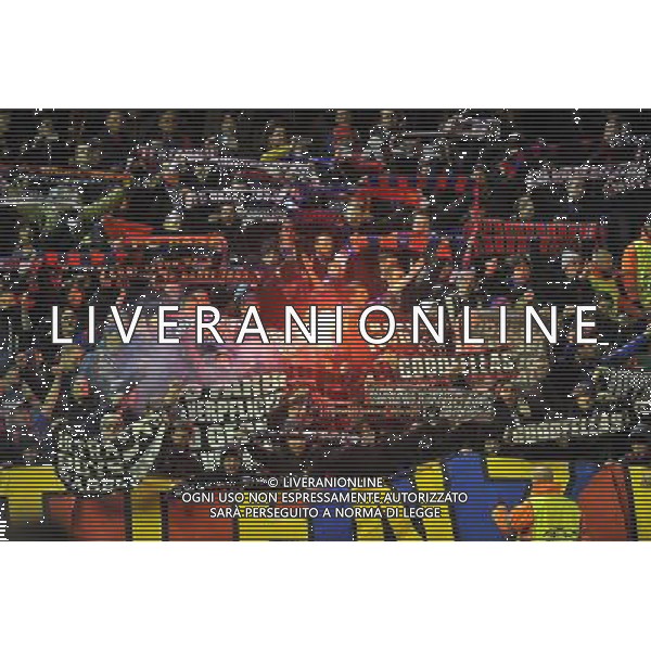 FC Basel fans light a flare prior to kick off Photographer Dave Howarth/CameraSport Football - UEFA Champions League Group B - Liverpool v Basel - Tuesday 9th December 2014 - Anfield - Liverpool © CameraSport - 43 Linden Ave. Countesthorpe. Leicester. England. LE8 5PG - Tel: +44 (0) 116 277 4147 - admin@camerasport.com - www.camerasport.com AG ALDO LIVERANI SAS ONLY ITALY