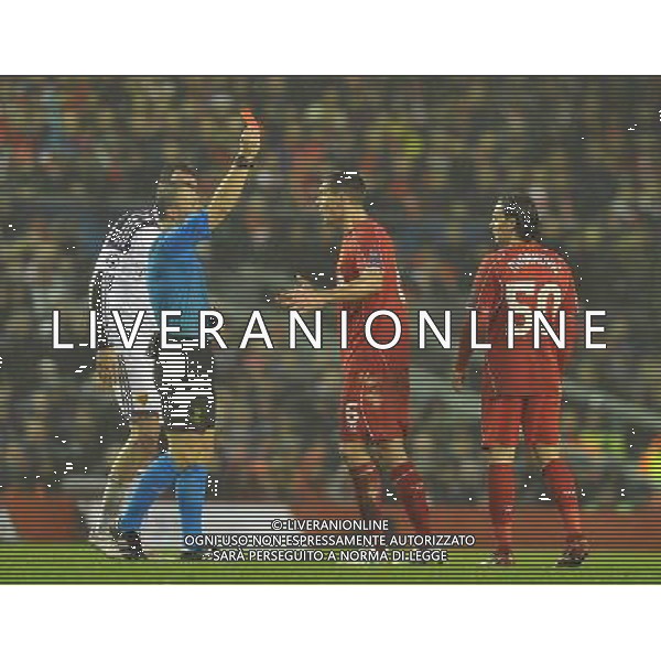 Liverpool\'s Lazar Markovi (right) is red carded by Referee Bjšrn Kuipers Photographer Dave Howarth/CameraSport Football - UEFA Champions League Group B - Liverpool v Basel - Tuesday 9th December 2014 - Anfield - Liverpool © CameraSport - 43 Linden Ave. Countesthorpe. Leicester. England. LE8 5PG - Tel: +44 (0) 116 277 4147 - admin@camerasport.com - www.camerasport.com AG ALDO LIVERANI SAS ONLY ITALY