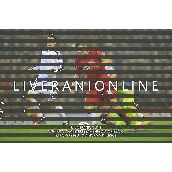 Liverpool\'s Steven Gerrard is brought down in the penalty area but was not given a penalty Photographer Dave Howarth/CameraSport Football - UEFA Champions League Group B - Liverpool v Basel - Tuesday 9th December 2014 - Anfield - Liverpool © CameraSport - 43 Linden Ave. Countesthorpe. Leicester. England. LE8 5PG - Tel: +44 (0) 116 277 4147 - admin@camerasport.com - www.camerasport.com AG ALDO LIVERANI SAS ONLY ITALY