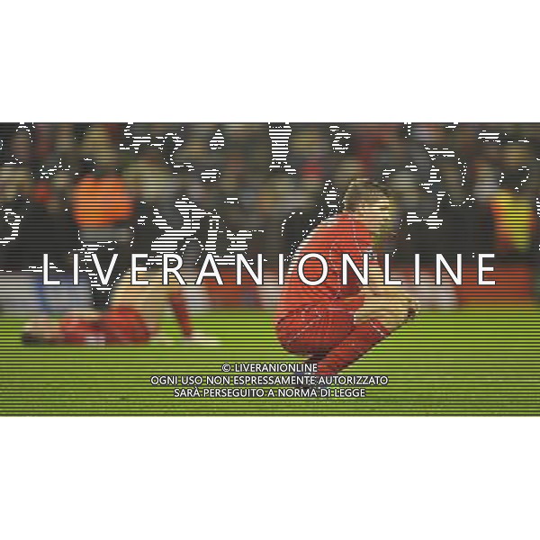 A dejected Liverpool\'s Steven Gerrard after his team exit the Champions League Photographer Dave Howarth/CameraSport Football - UEFA Champions League Group B - Liverpool v Basel - Tuesday 9th December 2014 - Anfield - Liverpool © CameraSport - 43 Linden Ave. Countesthorpe. Leicester. England. LE8 5PG - Tel: +44 (0) 116 277 4147 - admin@camerasport.com - www.camerasport.com AG ALDO LIVERANI SAS ONLY ITALY