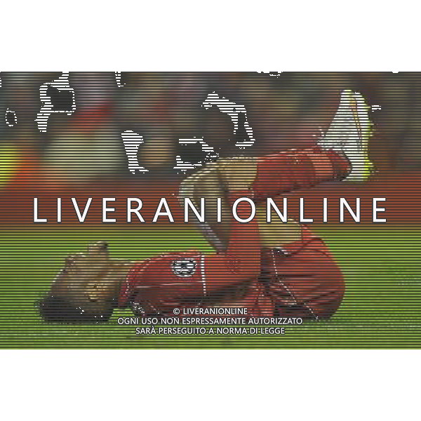 Liverpool\'s Raheem Sterling holds his shin in pain Photographer Dave Howarth/CameraSport Football - UEFA Champions League Group B - Liverpool v Basel - Tuesday 9th December 2014 - Anfield - Liverpool © CameraSport - 43 Linden Ave. Countesthorpe. Leicester. England. LE8 5PG - Tel: +44 (0) 116 277 4147 - admin@camerasport.com - www.camerasport.com AG ALDO LIVERANI SAS ONLY ITALY