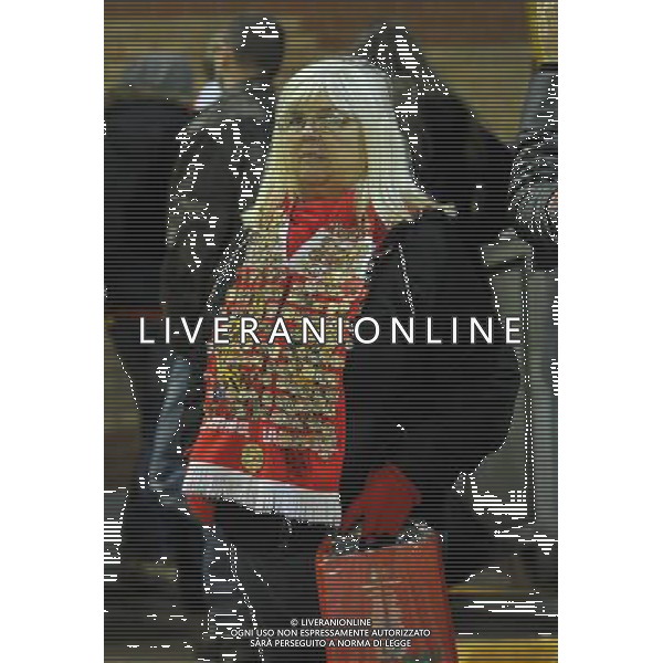 A Liverpool fan is dejected as her beloved team exit the Champions League Photographer Dave Howarth/CameraSport Football - UEFA Champions League Group B - Liverpool v Basel - Tuesday 9th December 2014 - Anfield - Liverpool © CameraSport - 43 Linden Ave. Countesthorpe. Leicester. England. LE8 5PG - Tel: +44 (0) 116 277 4147 - admin@camerasport.com - www.camerasport.com AG ALDO LIVERANI SAS ONLY ITALY
