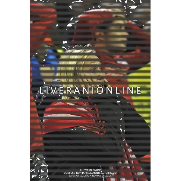 A Liverpool fan looks dejected as her team are knocked out of the Champions League Photographer Dave Howarth/CameraSport Football - UEFA Champions League Group B - Liverpool v Basel - Tuesday 9th December 2014 - Anfield - Liverpool © CameraSport - 43 Linden Ave. Countesthorpe. Leicester. England. LE8 5PG - Tel: +44 (0) 116 277 4147 - admin@camerasport.com - www.camerasport.com AG ALDO LIVERANI SAS ONLY ITALY