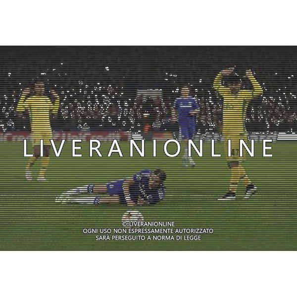Chelsea\'s Filipe Luis is fouled by Ricardo Esgaio leading to a penalty Photographer Ashley Western/CameraSport Football - UEFA Champions League Group G - Chelsea v Sporting Lisbon - Wednesday 10th December 2014 - Stamford Bridge - London © CameraSport - 43 Linden Ave. Countesthorpe. Leicester. England. LE8 5PG - Tel: +44 (0) 116 277 4147 - admin@camerasport.com - www.camerasport.com /Agenzia Aldo Liverani Sas - ITALY ONLY - EDITORIAL USE ONLY