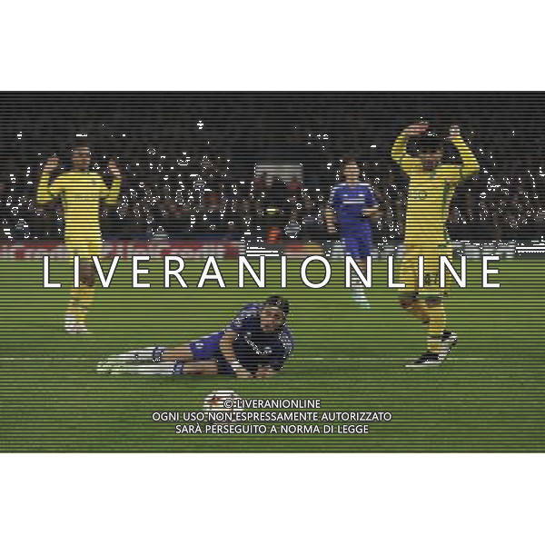 Chelsea\'s Filipe Luis is fouled by Ricardo Esgaio leading to a penalty Photographer Ashley Western/CameraSport Football - UEFA Champions League Group G - Chelsea v Sporting Lisbon - Wednesday 10th December 2014 - Stamford Bridge - London © CameraSport - 43 Linden Ave. Countesthorpe. Leicester. England. LE8 5PG - Tel: +44 (0) 116 277 4147 - admin@camerasport.com - www.camerasport.com /Agenzia Aldo Liverani Sas - ITALY ONLY - EDITORIAL USE ONLY