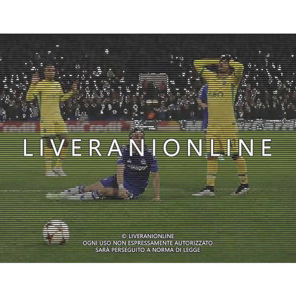 Chelsea\'s Filipe Luis is fouled by Ricardo Esgaio leading to a penalty Photographer Ashley Western/CameraSport Football - UEFA Champions League Group G - Chelsea v Sporting Lisbon - Wednesday 10th December 2014 - Stamford Bridge - London © CameraSport - 43 Linden Ave. Countesthorpe. Leicester. England. LE8 5PG - Tel: +44 (0) 116 277 4147 - admin@camerasport.com - www.camerasport.com /Agenzia Aldo Liverani Sas - ITALY ONLY - EDITORIAL USE ONLY