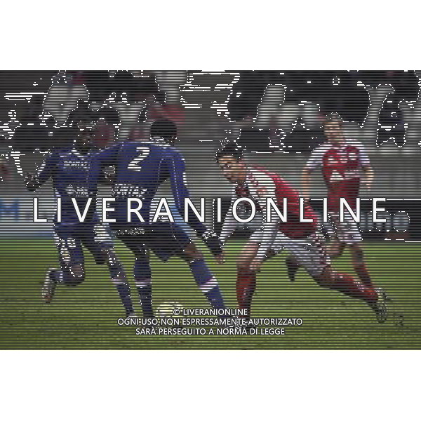 Kassim ABDALLAH / Diego RIGONATO - 13.12.2014 - Reims / Evian Thonon - 18eme journee de Ligue1 Photo : Fred Porcu / Icon Sport AG ALDO LIVERANI SAS ONLY ITALY