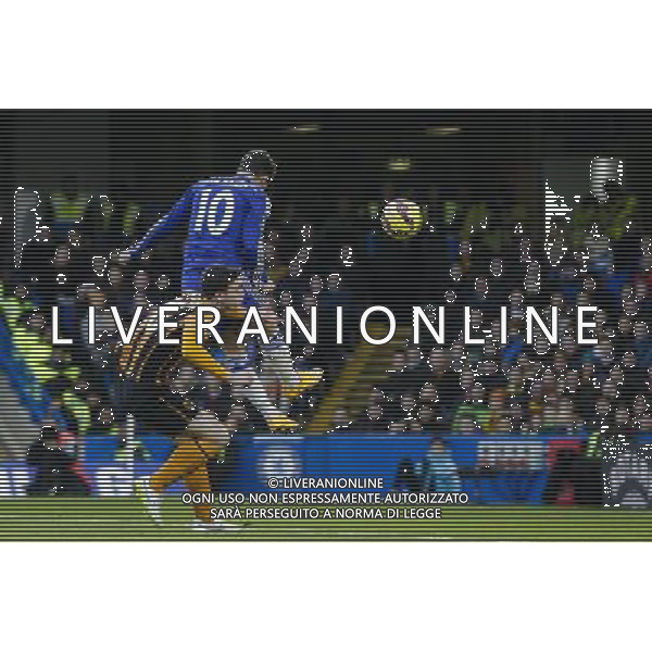 Chelsea\'s Eden Hazard rises above Hull City\'s Andrew Robertson to score his side\'s opening goal Photographer Craig Mercer/CameraSport Football - Barclays Premiership - Chelsea v Hull City - Saturday 13th December 2014 - Stamford Bridge - London © CameraSport - 43 Linden Ave. Countesthorpe. Leicester. England. LE8 5PG - Tel: +44 (0) 116 277 4147 - admin@camerasport.com - www.camerasport.com AG ALDO LIVERANI SAS ONLY ITALY