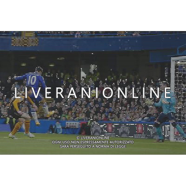 Chelsea\'s Eden Hazard rises above Hull City\'s Andrew Robertson to score his side\'s opening goal Photographer Craig Mercer/CameraSport Football - Barclays Premiership - Chelsea v Hull City - Saturday 13th December 2014 - Stamford Bridge - London © CameraSport - 43 Linden Ave. Countesthorpe. Leicester. England. LE8 5PG - Tel: +44 (0) 116 277 4147 - admin@camerasport.com - www.camerasport.com AG ALDO LIVERANI SAS ONLY ITALY