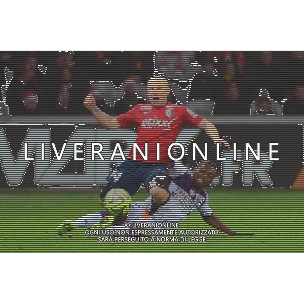 Florent BALMONT / Jean Daniel AKPA AKPRO - 14.12.2014 - Lille / Toulouse - 18eme journee de Ligue1 Photo : Dave Winter / Icon Sport *** Local Caption *** AG ALDO LIVERANI SAS ONLY ITALY *** Local Caption *** AG ALDO LIVERANI SAS ONLY ITALY