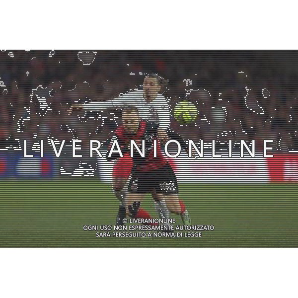 Zlatan IBRAHIMOVIC / Lars JACOBSEN - 14.12.2014 - Guingamp / PSG - 18eme journee de Ligue1 Photo : Vincent Michel / Icon Sport *** Local Caption *** AG ALDO LIVERANI SAS ONLY ITALY *** Local Caption *** AG ALDO LIVERANI SAS ONLY ITALY