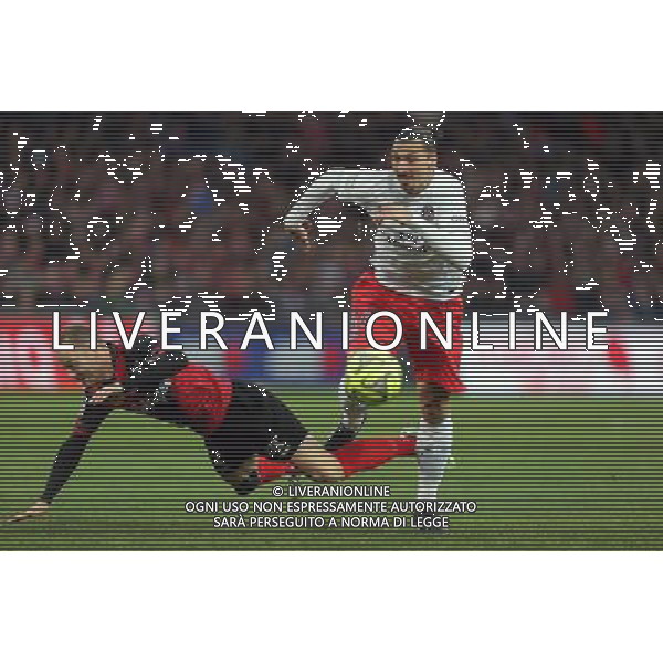 Zlatan IBRAHIMOVIC / Lars JACOBSEN - 14.12.2014 - Guingamp / PSG - 18eme journee de Ligue1 Photo : Vincent Michel / Icon Sport *** Local Caption *** AG ALDO LIVERANI SAS ONLY ITALY *** Local Caption *** AG ALDO LIVERANI SAS ONLY ITALY