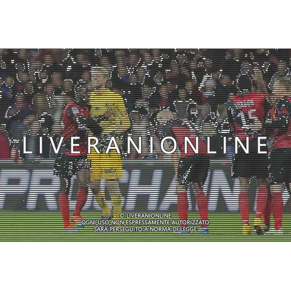 Joie Guingamp - Jonas LOSSL / Benjamin BROU ANGOUA - 14.12.2014 - Guingamp / Paris Saint Germain - 18eme journee de Ligue 1 Photo : Vincent Michel / Icon Sport /Agenzia Aldo Liverani sas - ITALY ONLY - EDITORIAL USE ONLY