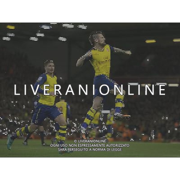Arsenal\'s Mathieu Debuchy celebrates scoring his sides equalising goal to make the score 1-1 Photographer Stephen White/CameraSport Football - Barclays Premiership - Liverpool v Arsenal - Sunday 21st December 2014 - Anfield - Liverpool © CameraSport - 43 Linden Ave. Countesthorpe. Leicester. England. LE8 5PG - Tel: +44 (0) 116 277 4147 - admin@camerasport.com - www.camerasport.com /Agenzia Aldo Liverani Sas - ITALY ONLY - EDITORIAL USE ONLY