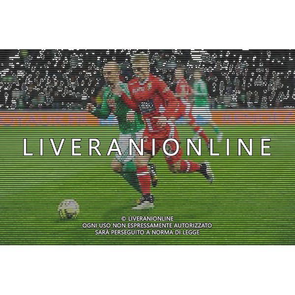 Renaud COHADE / Daniel WASS - 21.12.2014 - Saint Etienne / Evian Thonon - 19eme journee de Ligue 1 Photo : Jean Paul Thomas / Icon Sport AG ALDO LIVERANI SAS ONLY ITALY