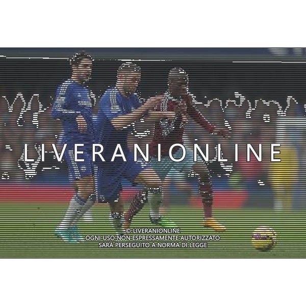 West Ham United\'s Enner Valenciaunder pressure from Chelsea\'s Gary Cahill Photographer Kieran Galvin/CameraSport Football - Barclays Premiership - Chelsea v West Ham United - Friday 26th December 2014 - Stamford Bridge - London © CameraSport - 43 Linden Ave. Countesthorpe. Leicester. England. LE8 5PG - Tel: +44 (0) 116 277 4147 - admin@camerasport.com - www.camerasport.com AG ALDO LIVERANI SAS ONLY ITALY