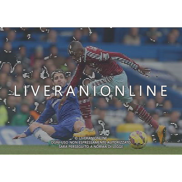West Ham United\'s Enner Valencia under pressure from Chelsea\'s Cesc Fabregas Photographer Kieran Galvin/CameraSport Football - Barclays Premiership - Chelsea v West Ham United - Friday 26th December 2014 - Stamford Bridge - London © CameraSport - 43 Linden Ave. Countesthorpe. Leicester. England. LE8 5PG - Tel: +44 (0) 116 277 4147 - admin@camerasport.com - www.camerasport.com AG ALDO LIVERANI SAS ONLY ITALY