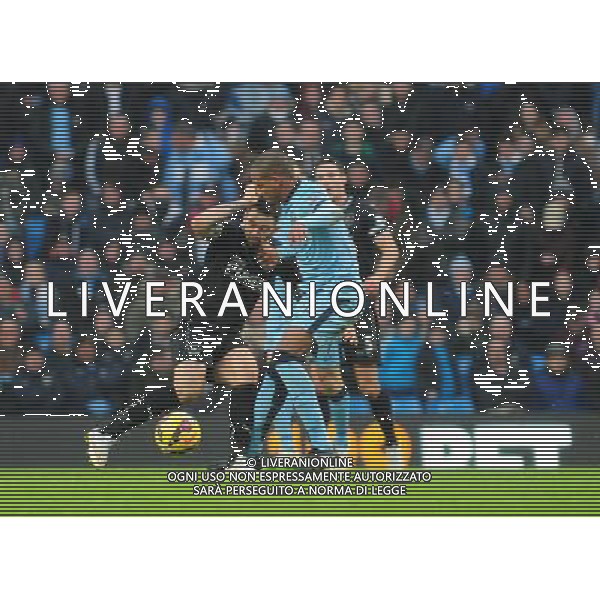 Burnley\'s Danny Ings vies for possession with Manchester City\'s Fernando Photographer Chris Vaughan/CameraSport Football - Barclays Premiership - Manchester City v Burnley - Sunday 28th December 2014 - Etihad Stadium - Manchester Â© CameraSport - 43 Linden Ave. Countesthorpe. Leicester. England. LE8 5PG - Tel: +44 (0) 116 277 4147 - admin@camerasport.com - www.camerasport.com AG ALDO LIVERANI SAS ONLY ITALY