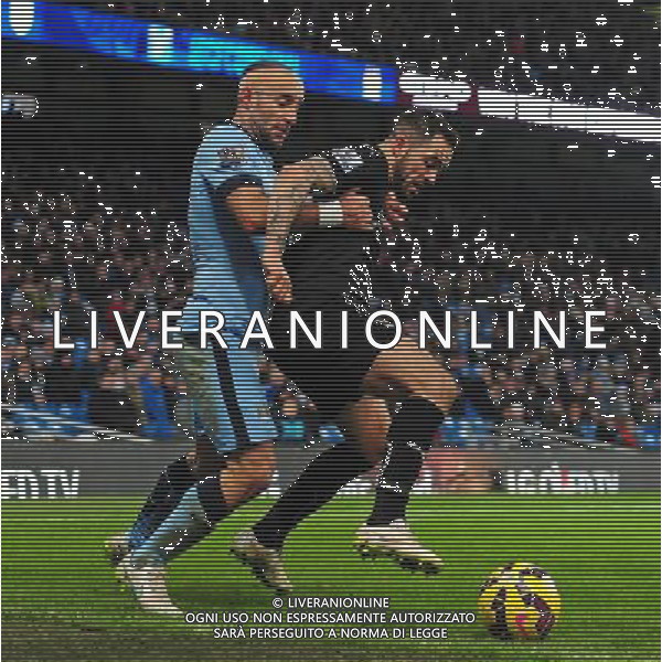 Burnley\'s Danny Ings shields the ball from Manchester City\'s Pablo Zabaleta Photographer Chris Vaughan/CameraSport Football - Barclays Premiership - Manchester City v Burnley - Sunday 28th December 2014 - Etihad Stadium - Manchester Â¬Â© CameraSport - 43 Linden Ave. Countesthorpe. Leicester. England. LE8 5PG - Tel: +44 (0) 116 277 4147 - admin@camerasport.com - www.camerasport.com AG ALDO LIVERANI SAS ONLY ITALY