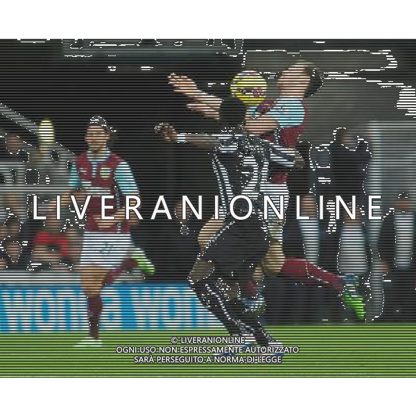 Burnley\'s Ashley Barnes vies for possession with Newcastle United\'s Cheik Ismael Tiote Photographer Chris Vaughan/CameraSport Football - Barclays Premiership - Newcastle United v Burnley - Thursday 1st January 2015 - St James\' Park - Newcastle © CameraSport - 43 Linden Ave. Countesthorpe. Leicester. England. LE8 5PG - Tel: +44 (0) 116 277 4147 - admin@camerasport.com - www.camerasport.com /AGENZIA ALDO LIVERANI SAS - ITALY ONLY - EDITORIAL USE ONLY