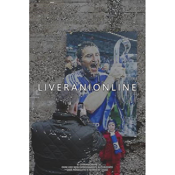A young fan poses for a photo beside a picture of Frank Lampard outside Stamford Bridge, home of Chelsea Photographer Craig Mercer/CameraSport Football - Barclays Premiership - Chelsea v Newcastle United - Saturday 10th January 2015 - Stamford Bridge - London å© CameraSport - 43 Linden Ave. Countesthorpe. Leicester. England. LE8 5PG - Tel: +44 (0) 116 277 4147 - admin@camerasport.com - www.camerasport.com /AGENZIA ALDO LIVERANI SAS - ITALY ONLY - EDITORIAL USE ONLY