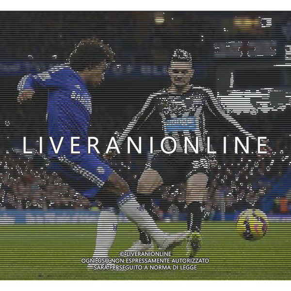 Chelsea\'s Willian under pressure from Newcastle United\'s Remy Cabella Photographer Craig Mercer/CameraSport Football - Barclays Premiership - Chelsea v Newcastle United - Saturday 10th January 2015 - Stamford Bridge - London © CameraSport - 43 Linden Ave. Countesthorpe. Leicester. England. LE8 5PG - Tel: +44 (0) 116 277 4147 - admin@camerasport.com - www.camerasport.com AG ALDO LIVERANI SAS ONLY ITALY