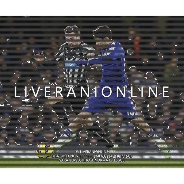 Chelsea\'s Diego Costa battles with Newcastle United\'s Paul Dummett Photographer Craig Mercer/CameraSport Football - Barclays Premiership - Chelsea v Newcastle United - Saturday 10th January 2015 - Stamford Bridge - London © CameraSport - 43 Linden Ave. Countesthorpe. Leicester. England. LE8 5PG - Tel: +44 (0) 116 277 4147 - admin@camerasport.com - www.camerasport.com AG ALDO LIVERANI SAS ONLY ITALY