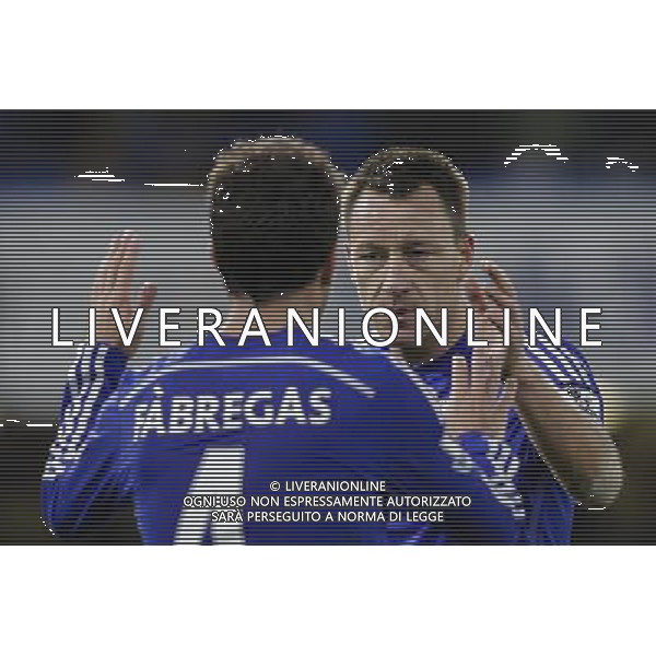 Chelsea\'s John Terry congratulates Cesc Fabregas at the final whistle after a 2-0 victory Photographer Craig Mercer/CameraSport Football - Barclays Premiership - Chelsea v Newcastle United - Saturday 10th January 2015 - Stamford Bridge - London © CameraSport - 43 Linden Ave. Countesthorpe. Leicester. England. LE8 5PG - Tel: +44 (0) 116 277 4147 - admin@camerasport.com - www.camerasport.com AG ALDO LIVERANI SAS ONLY ITALY