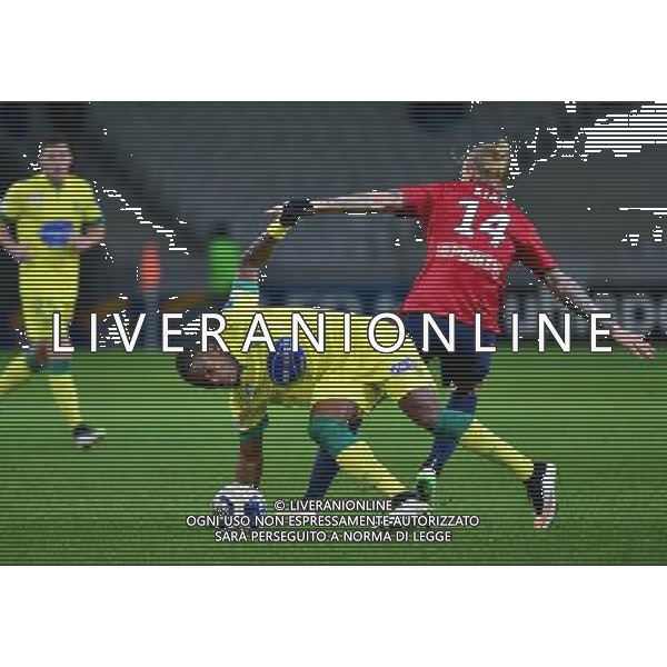 Serge GAKPE / Simon KJAER - 14.01.2014 - Lille / Nantes - 1/4Finale Coupe de la Ligue Photo : Dave Winter / Icon Sport AG ALDO LIVERANI SAS ONLY ITALY