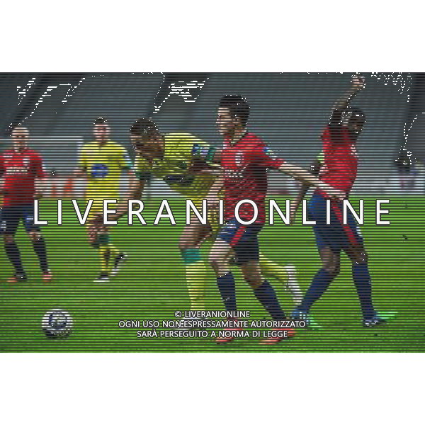 Yacine BAMMOU / Sebastien CORCHIA / Rio MAVUBA - 14.01.2014 - Lille / Nantes - 1/4Finale Coupe de la Ligue Photo : Dave Winter / Icon Sport AG ALDO LIVERANI SAS ONLY ITALY /Agenzia Aldo Liverani sas - ITALY ONLY - EDITORIAL USE ONLY