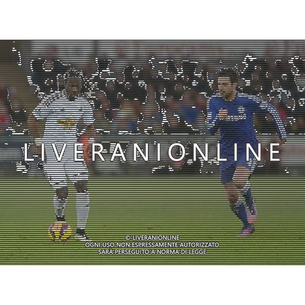 Swansea City\'s Marvin Emnes vies for possession with Chelsea\'s Cesc Fabregas Photographer /Ashley CrowdenCameraSport Football - Barclays Premiership - Swansea City v Chelsea - Saturday 17th January 2015 - Liberty Stadium - Swansea © CameraSport - 43 Linden Ave. Countesthorpe. Leicester. England. LE8 5PG - Tel: +44 (0) 116 277 4147 - admin@camerasport.com - www.camerasport.com AG ALDO LIVERANI SAS ONLY ITALY