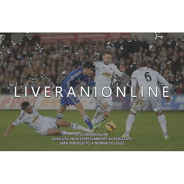 Chelsea\'s Diego Costa is tackled by Swansea City\'s Neil Taylor Photographer /Ashley CrowdenCameraSport Football - Barclays Premiership - Swansea City v Chelsea - Saturday 17th January 2015 - Liberty Stadium - Swansea © CameraSport - 43 Linden Ave. Countesthorpe. Leicester. England. LE8 5PG - Tel: +44 (0) 116 277 4147 - admin@camerasport.com - www.camerasport.com AG ALDO LIVERANI SAS ONLY ITALY